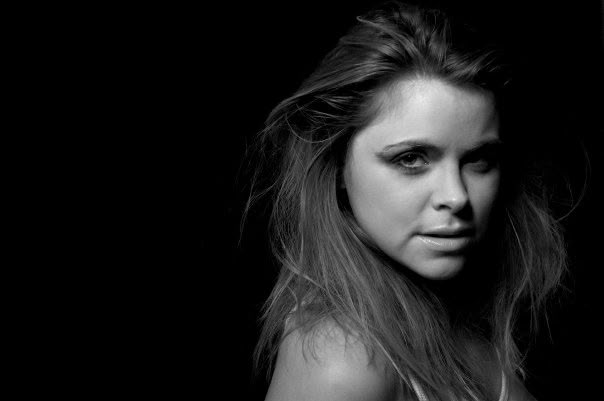 Black-and-white portrait of Victoria during her pop band years